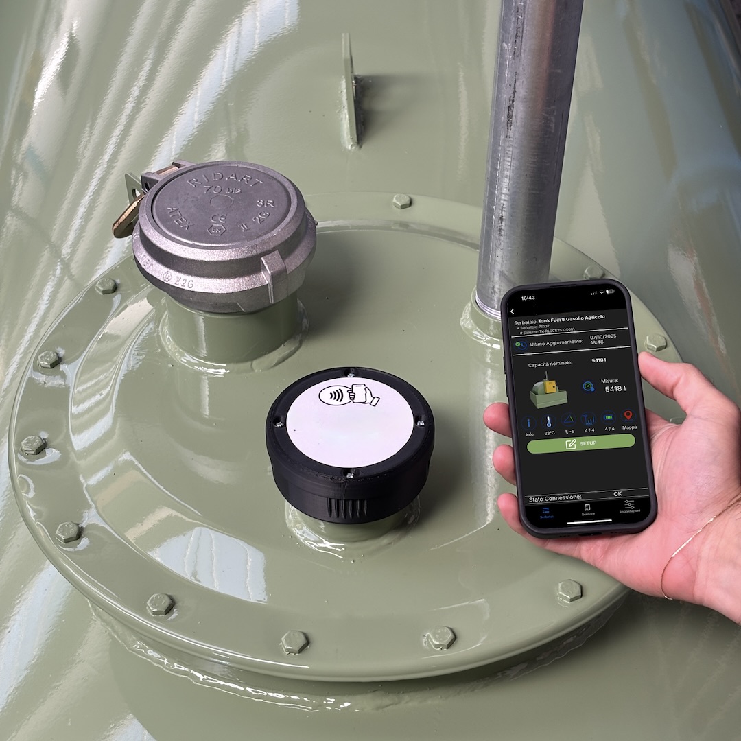 NFC tank-level sensor mounted on a tank manway with live readings on the mobile app