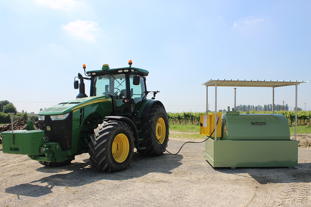 Farm fuel storage tank under canopy refueling a tractor