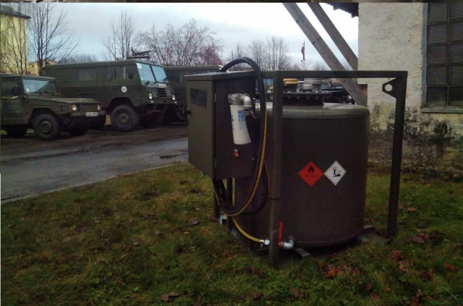 Framed transportable fuel tank with filtration unit deployed at a vehicle base