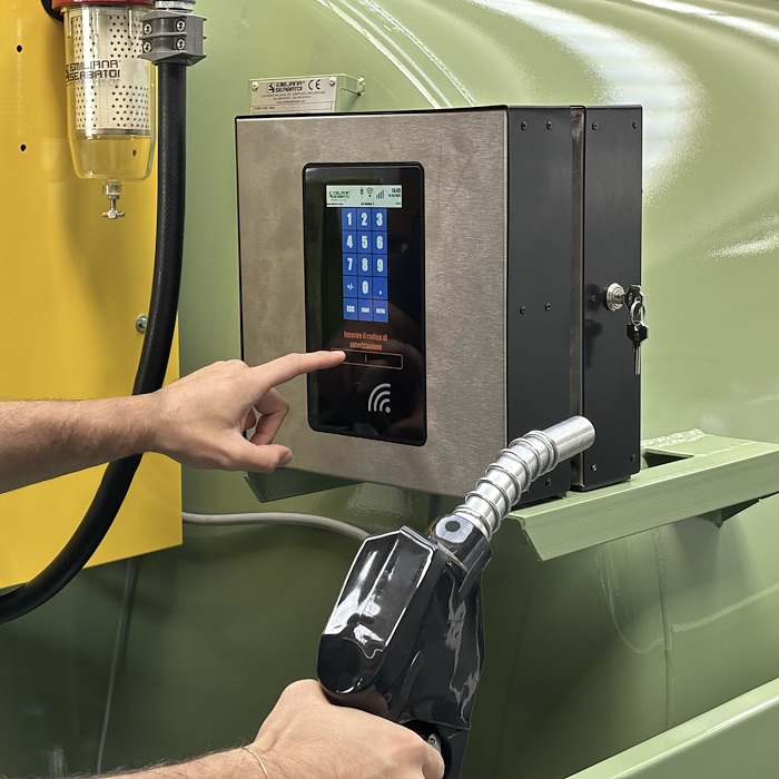 Stainless keypad access terminal authorizing a fuel dispensing nozzle at a tank