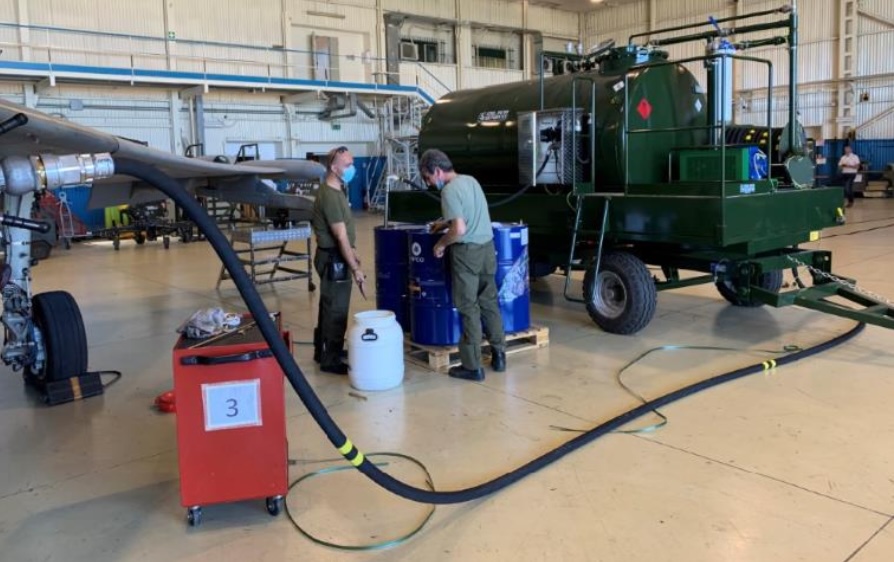 Mobile aviation refueling and filtration unit servicing an aircraft in a hangar
