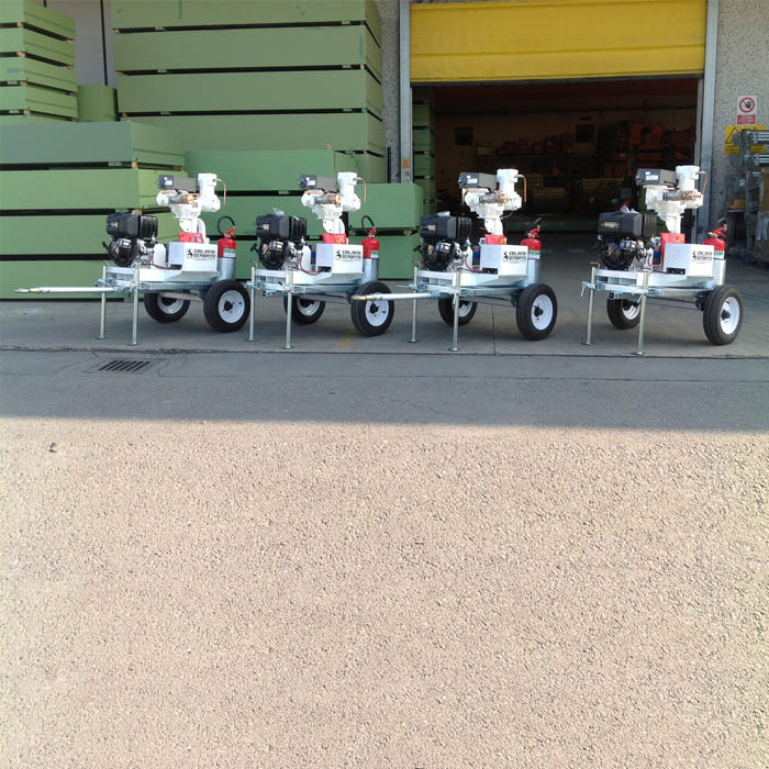 Four UN-marked fuel transfer pump trailers lined up in the yard