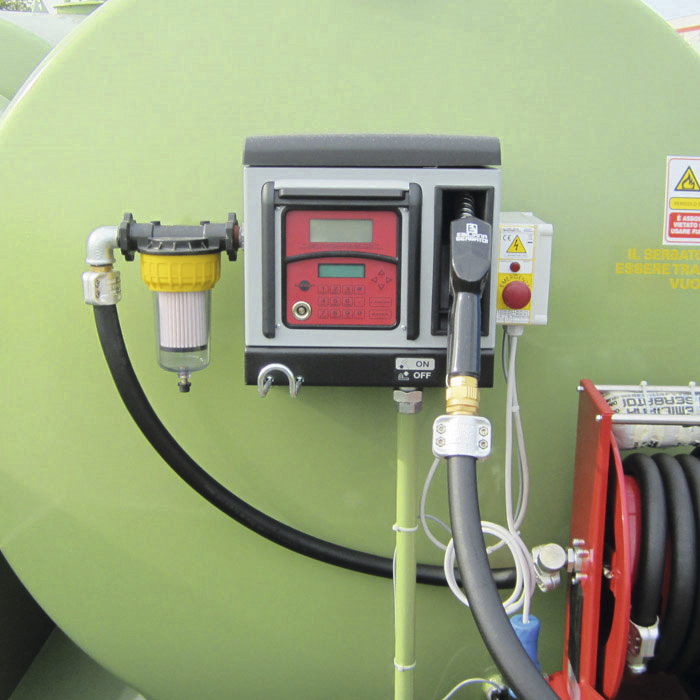 Tank-mounted metered dispensing unit with keypad, filter and hose reel